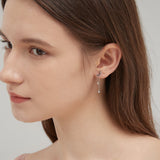 STMG Moon with Star Dangle Earrings in silver on ear