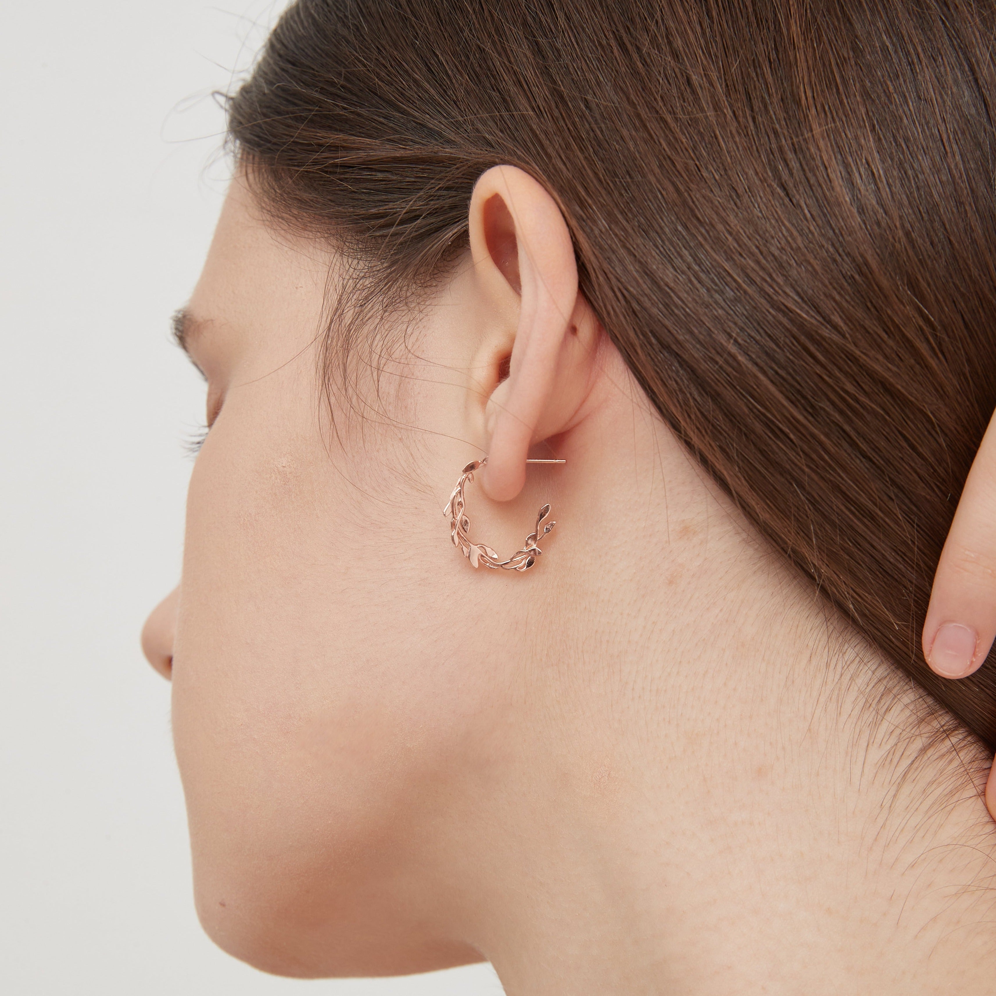 STMG Olive Leaf Adjustable Stud Earrings in rose gold on ear