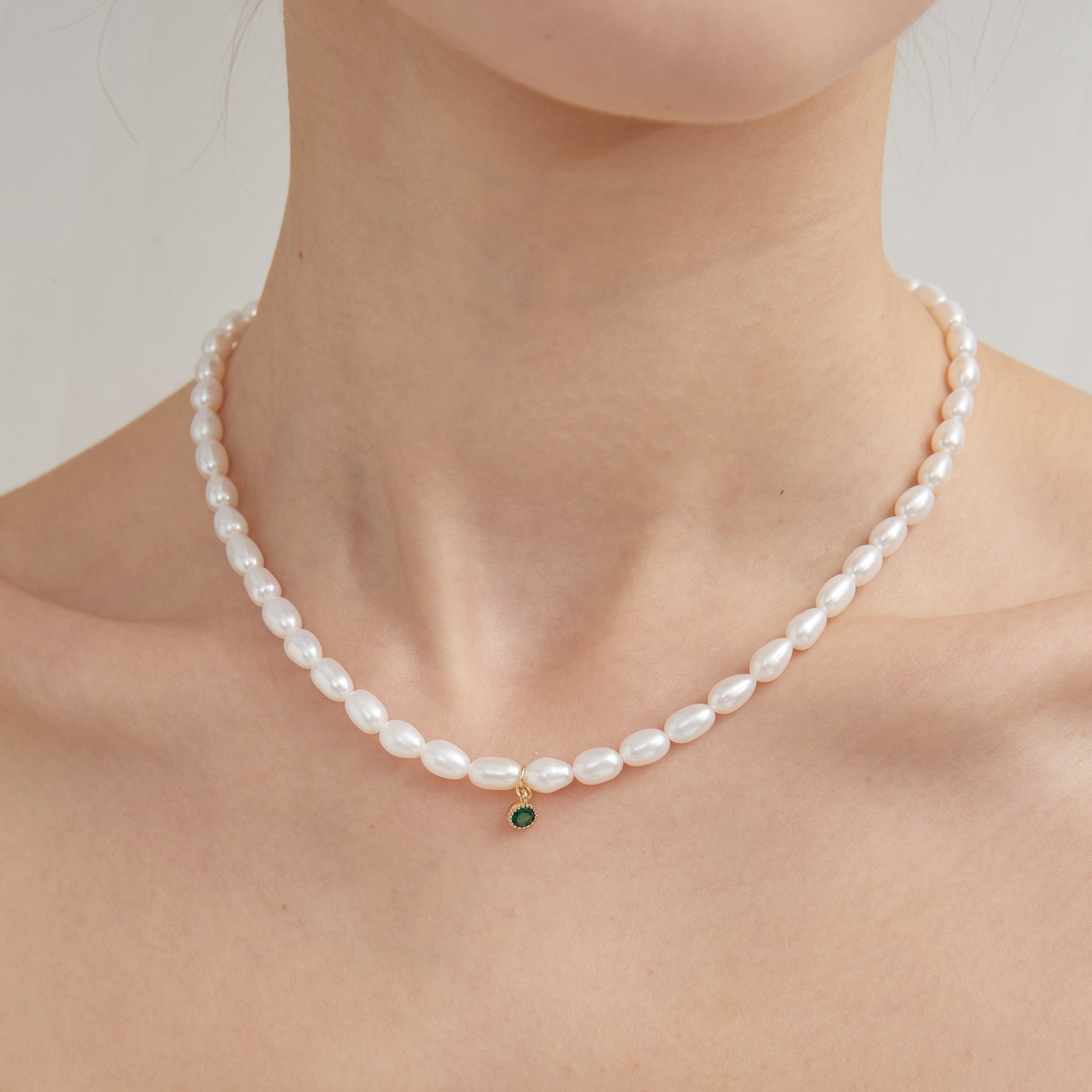 STMG Natural Pearl with Green Pendant Necklace on neck