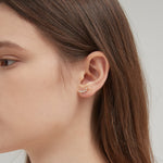 STMG Olive Leaf Stud Earrings in silver on ear