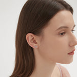 STMG Olive Leaf Stud Earrings in silver on ear