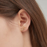 STMG Olive Leaf Stud Earrings in gold on ear