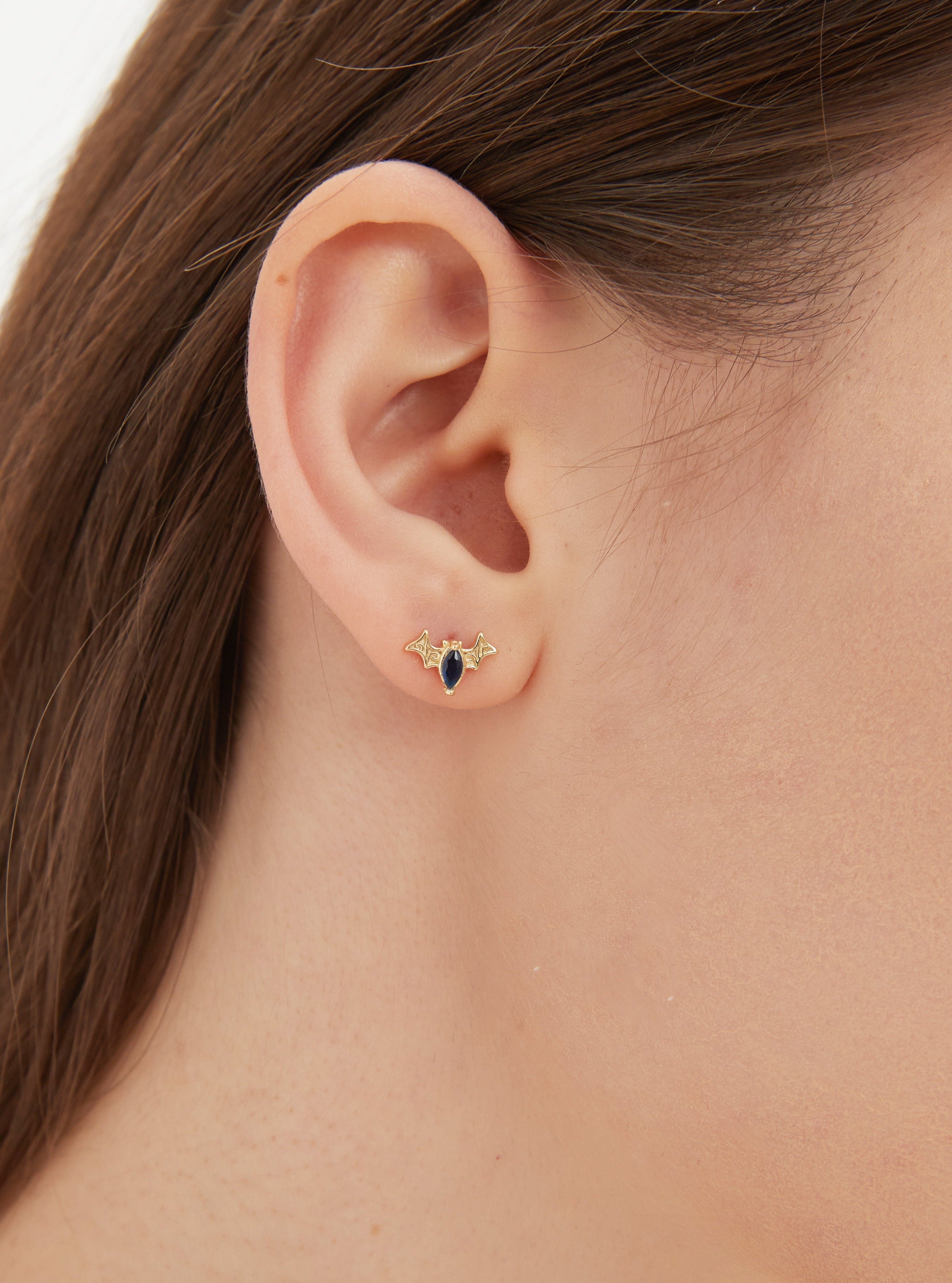 Black Bat Stud Earrings on ear