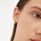 STMG Sweet Heart Hoops in gold on ear