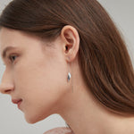 Blue Leaf Threader Earrings in silver on ear