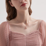 STMG Natural Rose Quartz Necklace on neck