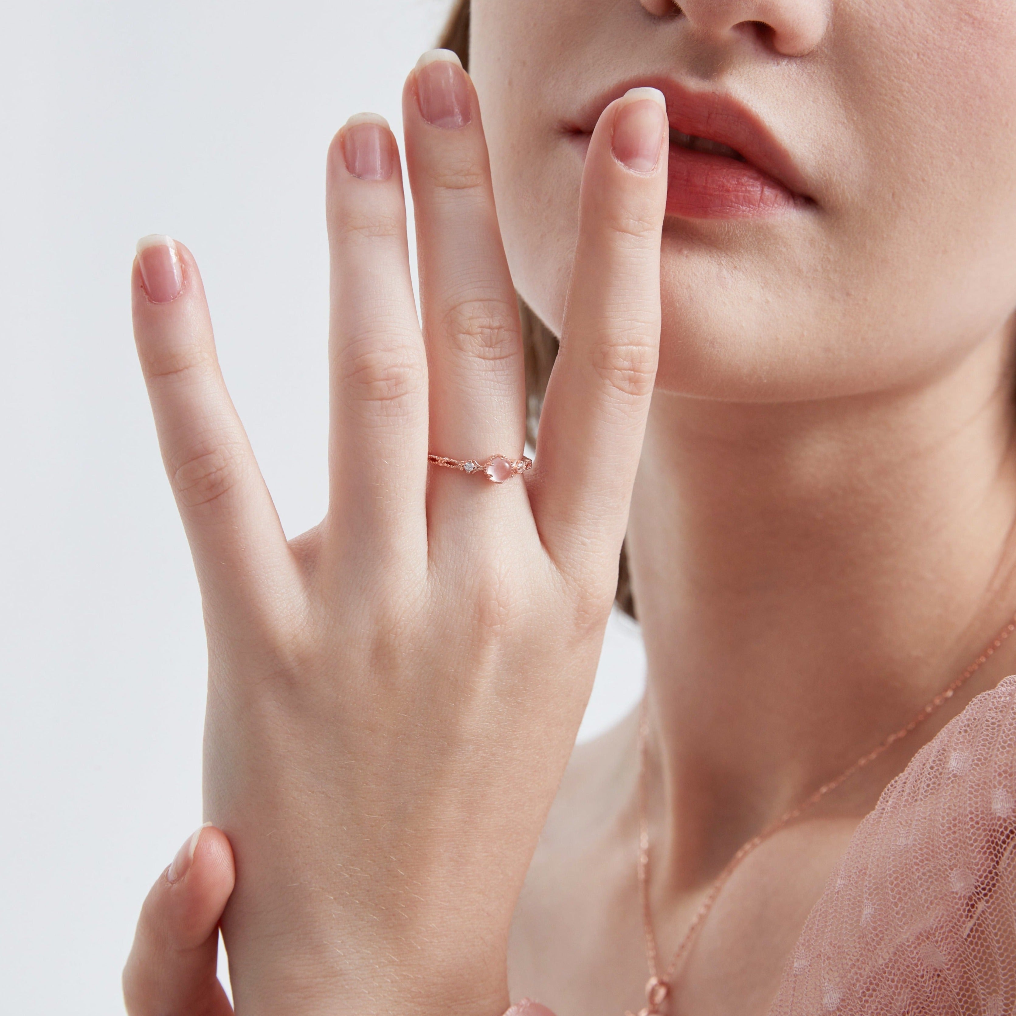 STMG Natural Rose Quartz Ring on finger