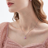 STMG Pink Heart Necklace on neck