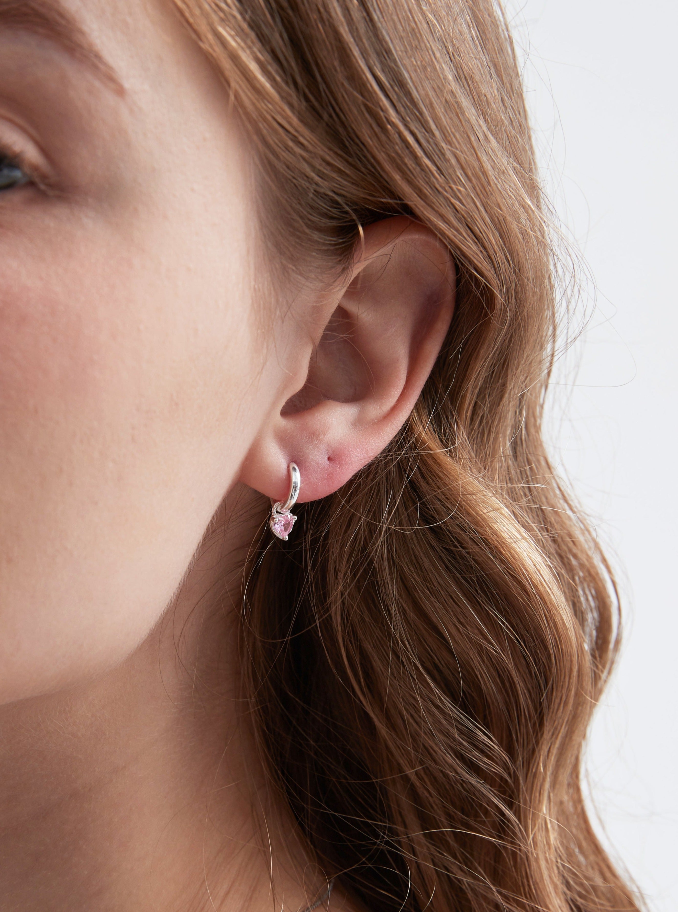 STMG Pink Heart Hoops on ear