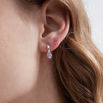 STMG Pink Heart Hoops on ear