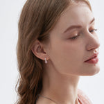 STMG Pink Heart Hoops on ear