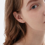 STMG Tiny Bowknot Stud Earrings on ear