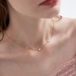 STMG Sweet Heart Necklace in gold on neck