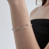 STMG Little Twinkle Star Bracelet in silver on hand