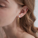 STMG Natural Pearl Tassel Dangle Earrings on ear