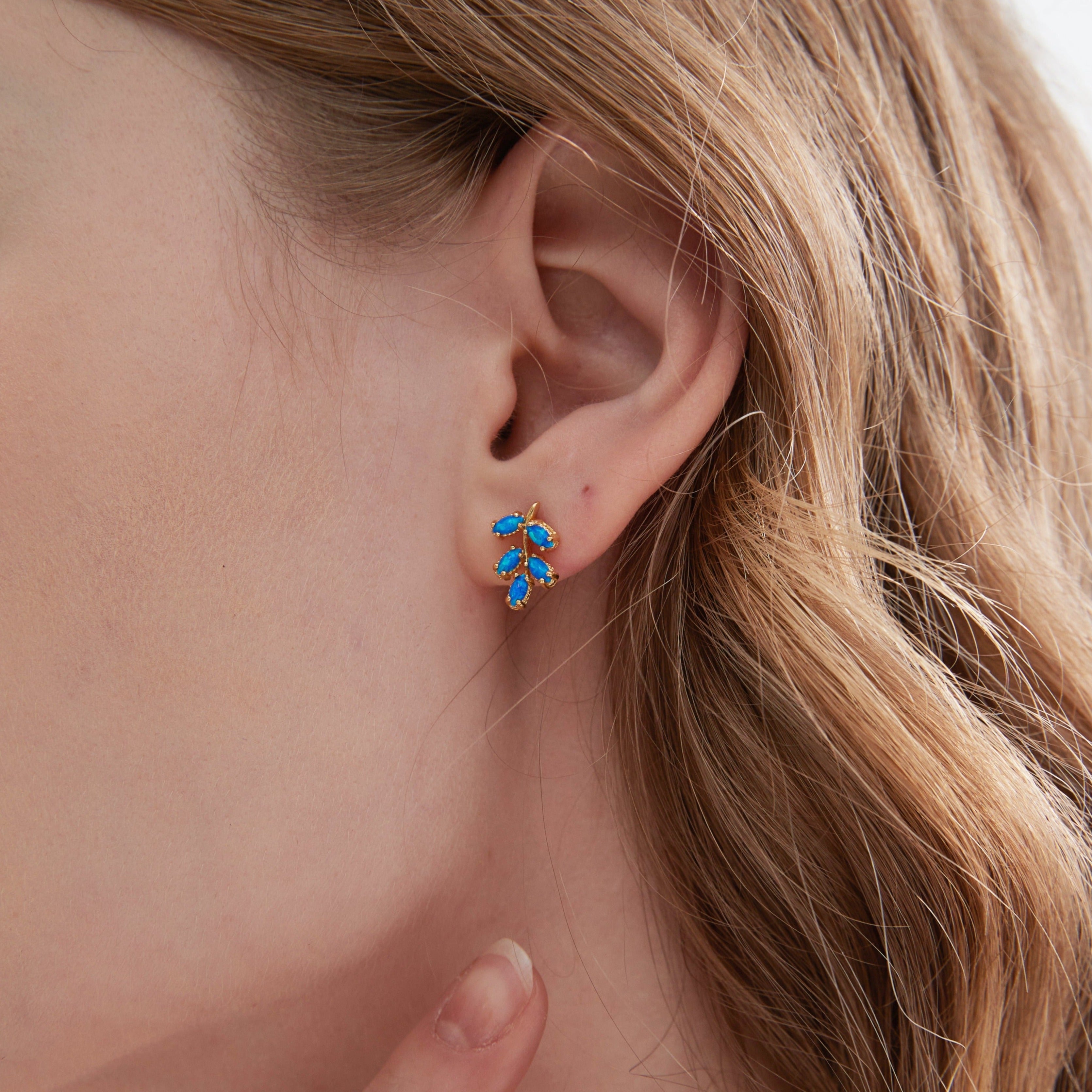 Blue Opal Olive Leaf Stud Earrings on ear