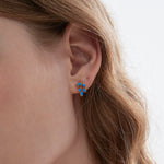 Blue Opal Olive Leaf Stud Earrings on ear