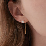 STMG Natural Pearl Dangle Threader Earrings in gold on ear