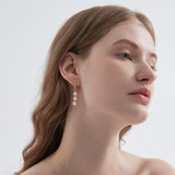 Boucles d'oreilles pendantes triples perles (S925)