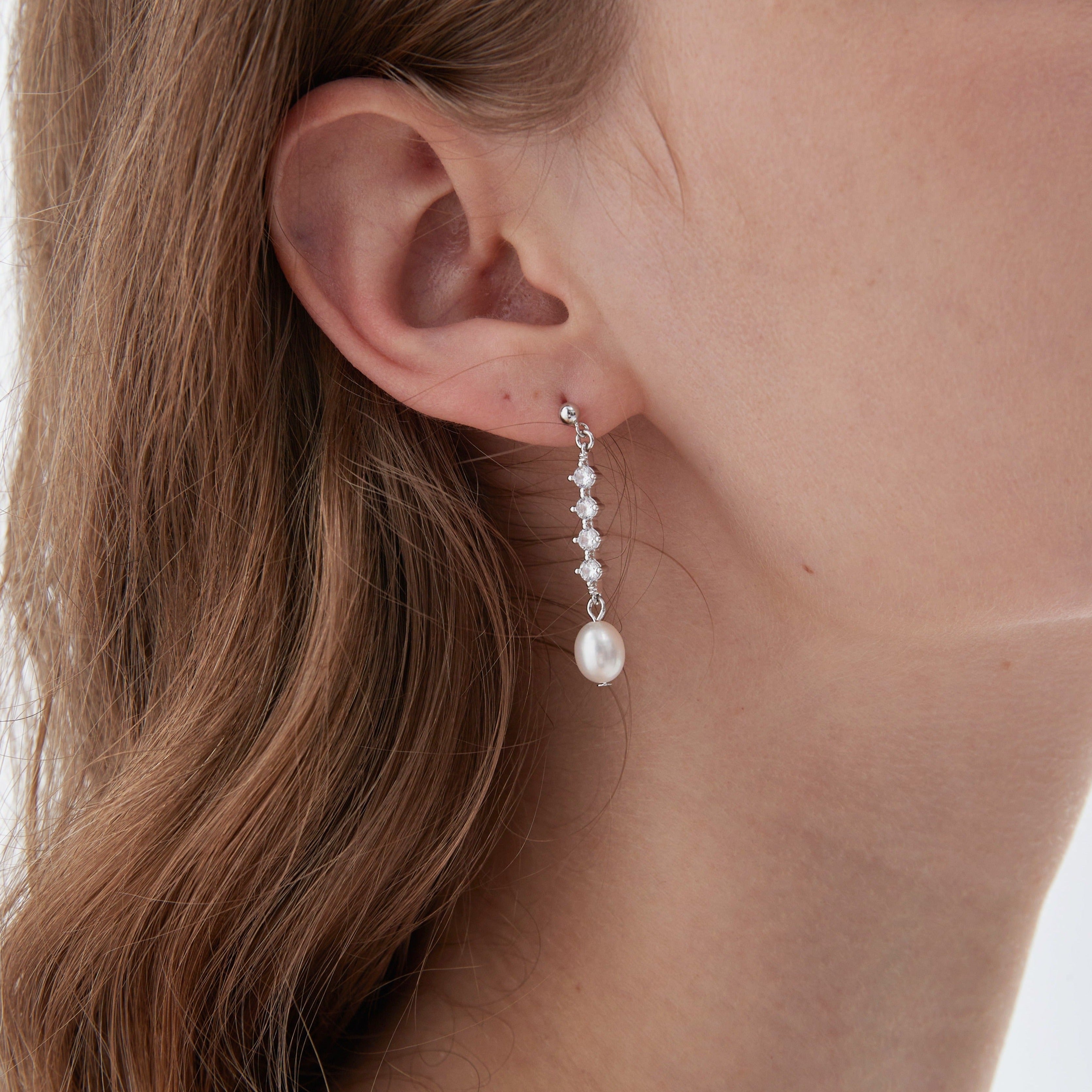 STMG Freshwater Pearl Drop Earrings in silver on ear