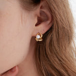 STMG Natural Pearl Heart Stud Earrings on ear