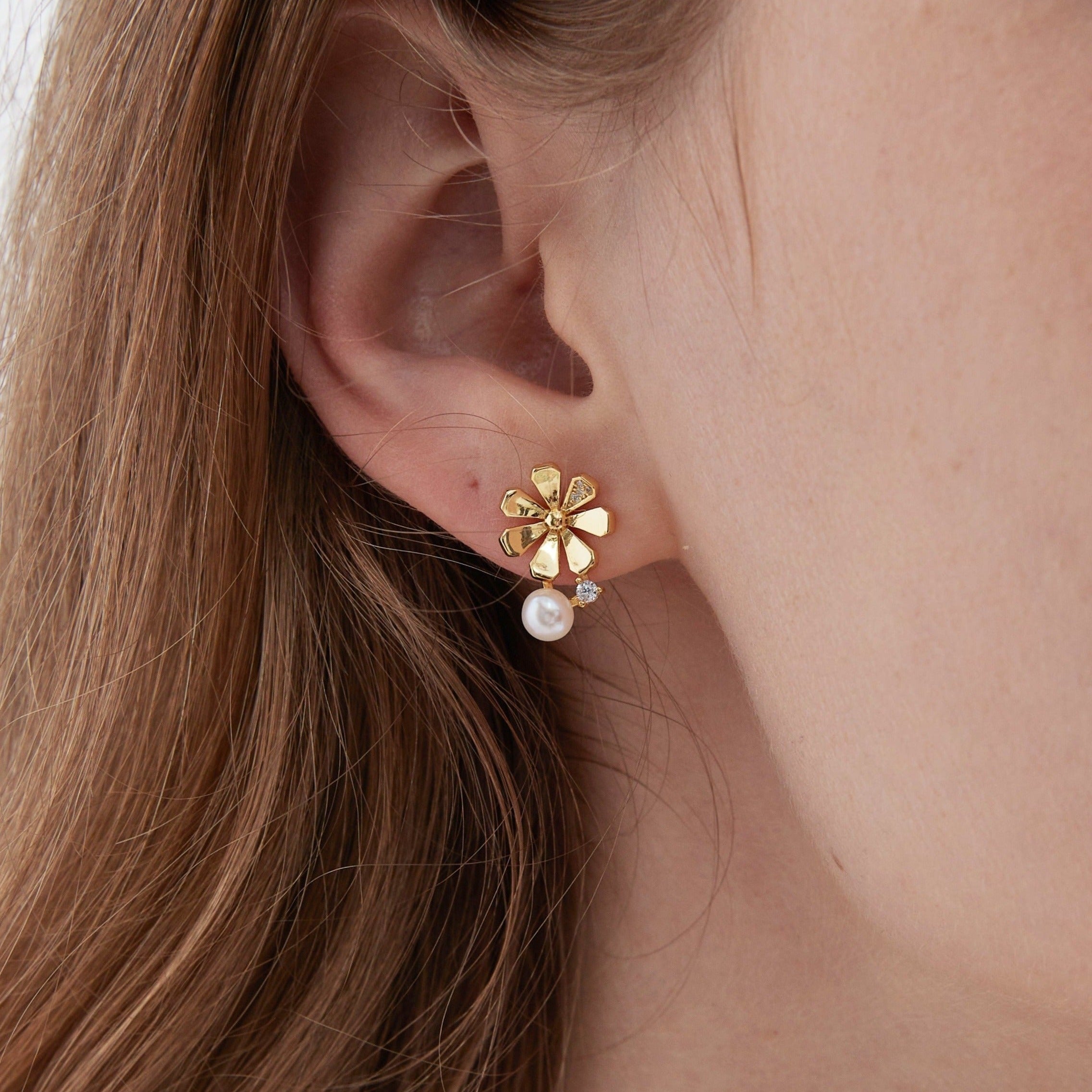 STMG Natural Pearl Daisy Stud Earrings on ear