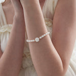 STMG Natural Pearl with Mother of Pearl Rose Bracelet on hand