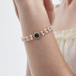 STMG Pearl with Sapphire Bracelet on hand