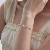 STMG Natural Bead Pearl Bracelet on hand