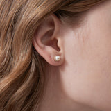 STMG Natural Pearl Stud Earrings on ear