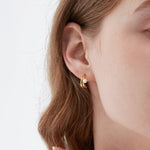 STMG Natural Pearl Stud Earrings on ear