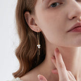 STMG Pearls Dangle Threader Earrings on ear