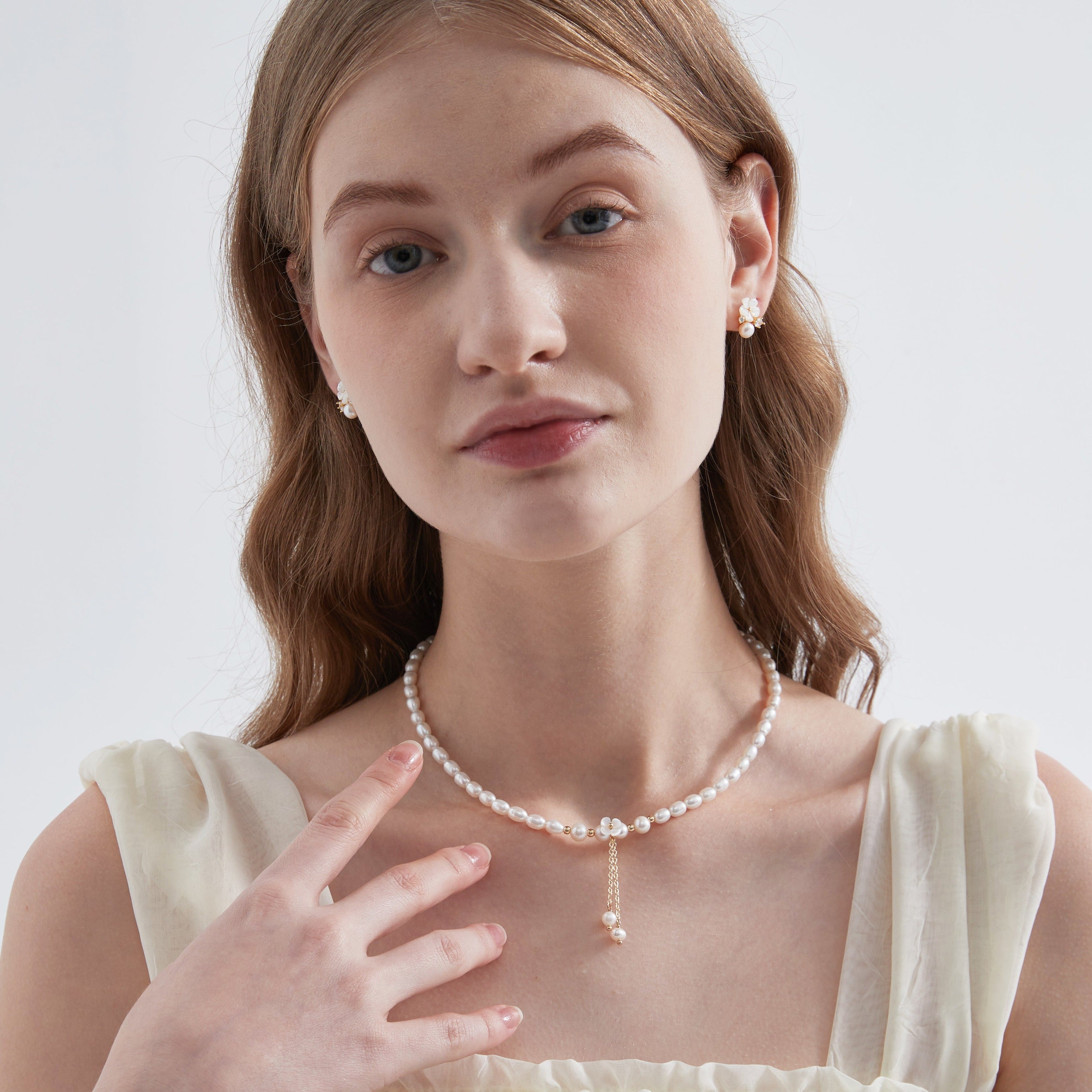 STMG Natural Pearl with Mother of Pearl Flower Necklace on neck with matching earrings on ear