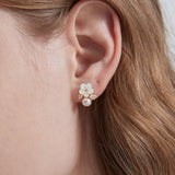 STMG Pearl Flower Stud Earrings on ear