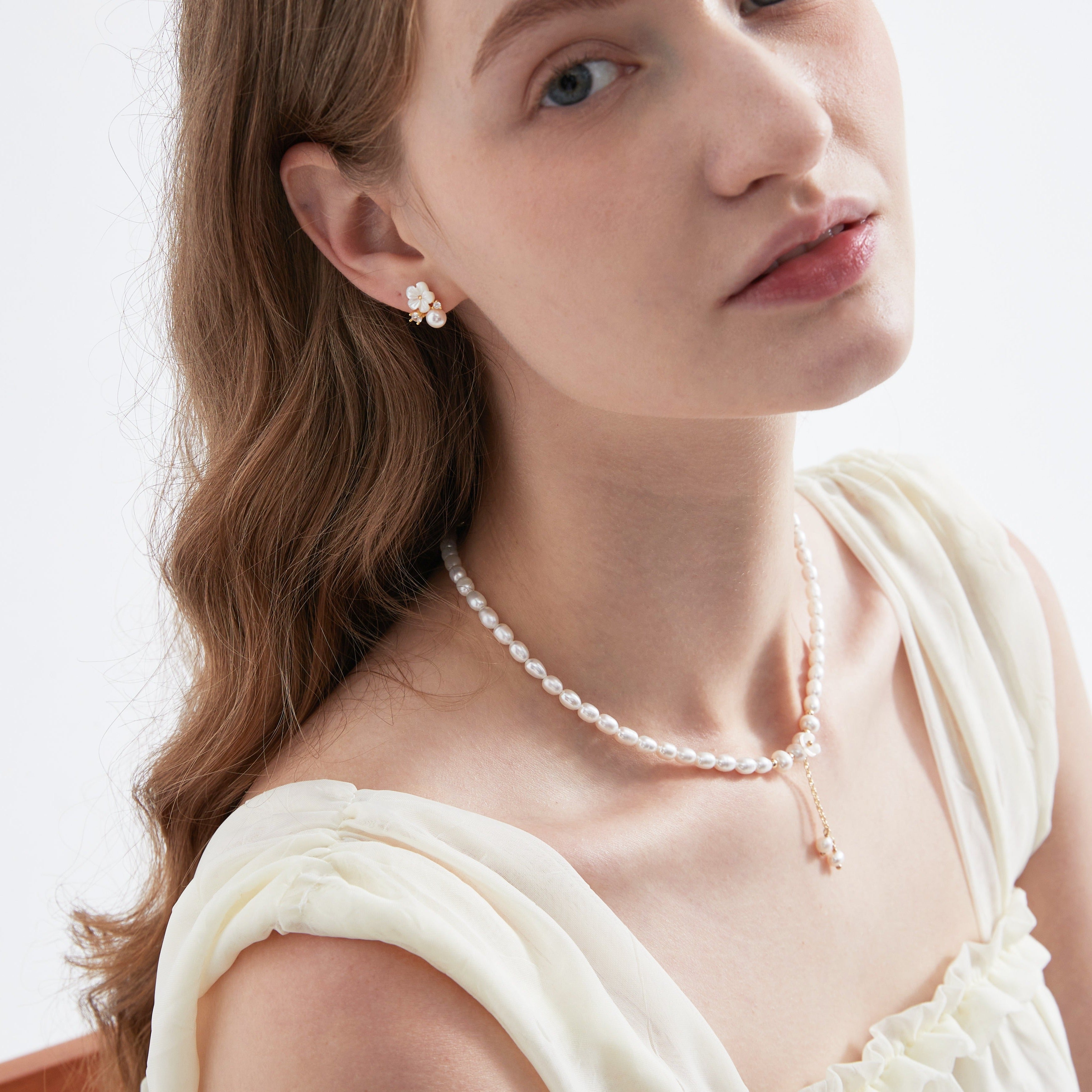 STMG Natural Pearl with Mother of Pearl Flower Necklace on neck with matching earrings on ear