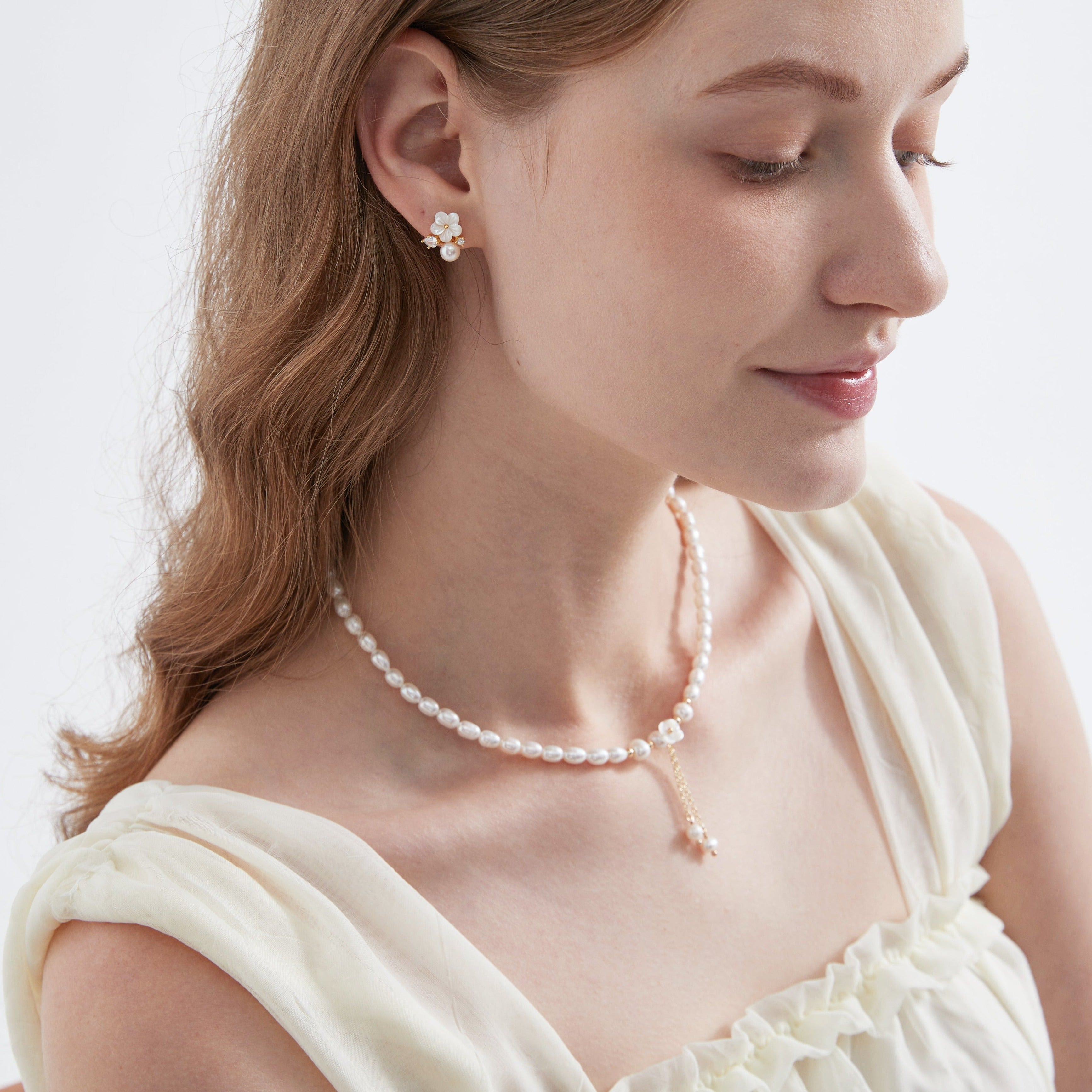 STMG Natural Pearl with Mother of Pearl Flower Necklace on neck with matching earrings on ear