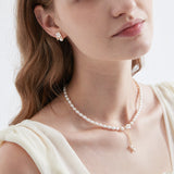 STMG Natural Pearl with Mother of Pearl Flower Necklace on neck with matching earrings on ear