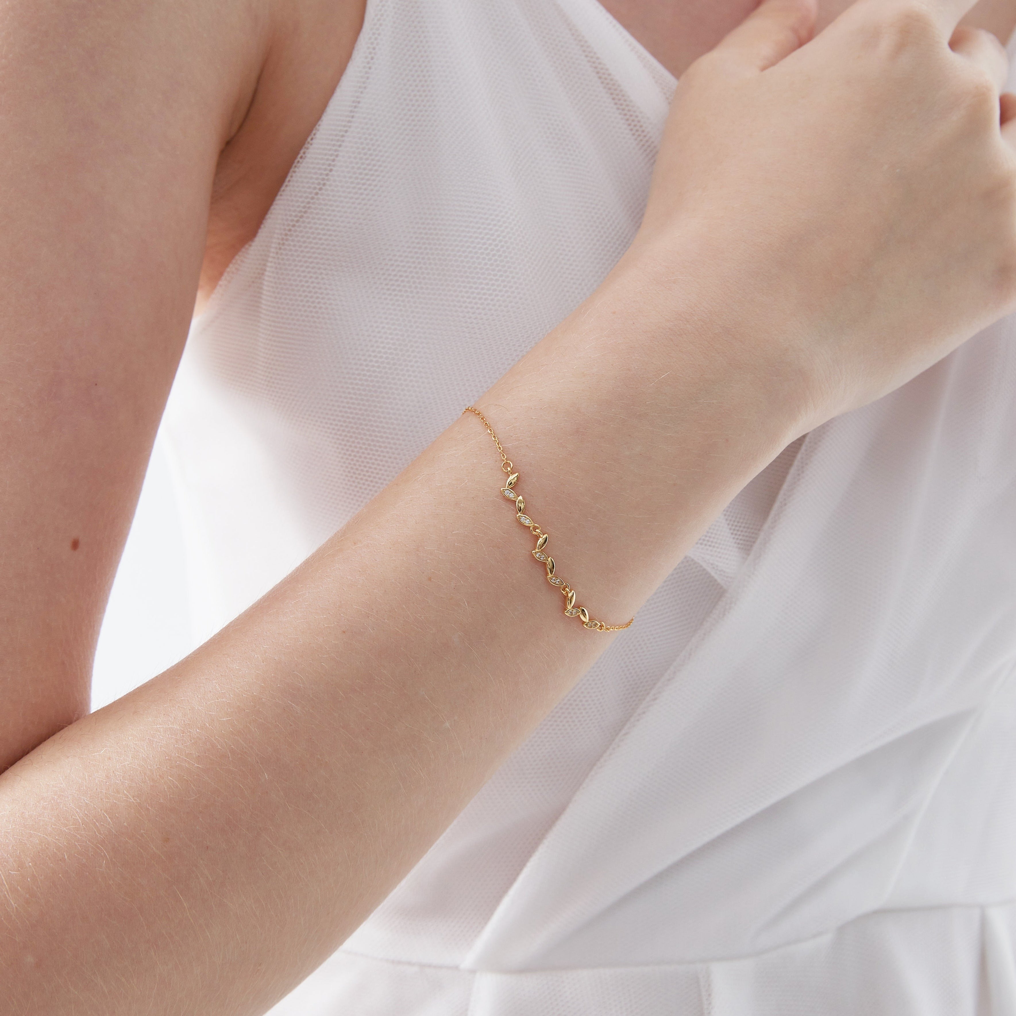 STMG Olive Leaf  Bracelet in gold on hand