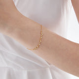 STMG Olive Leaf  Bracelet in gold on hand