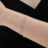 STMG Tiny Butterfly Bracelet on hand