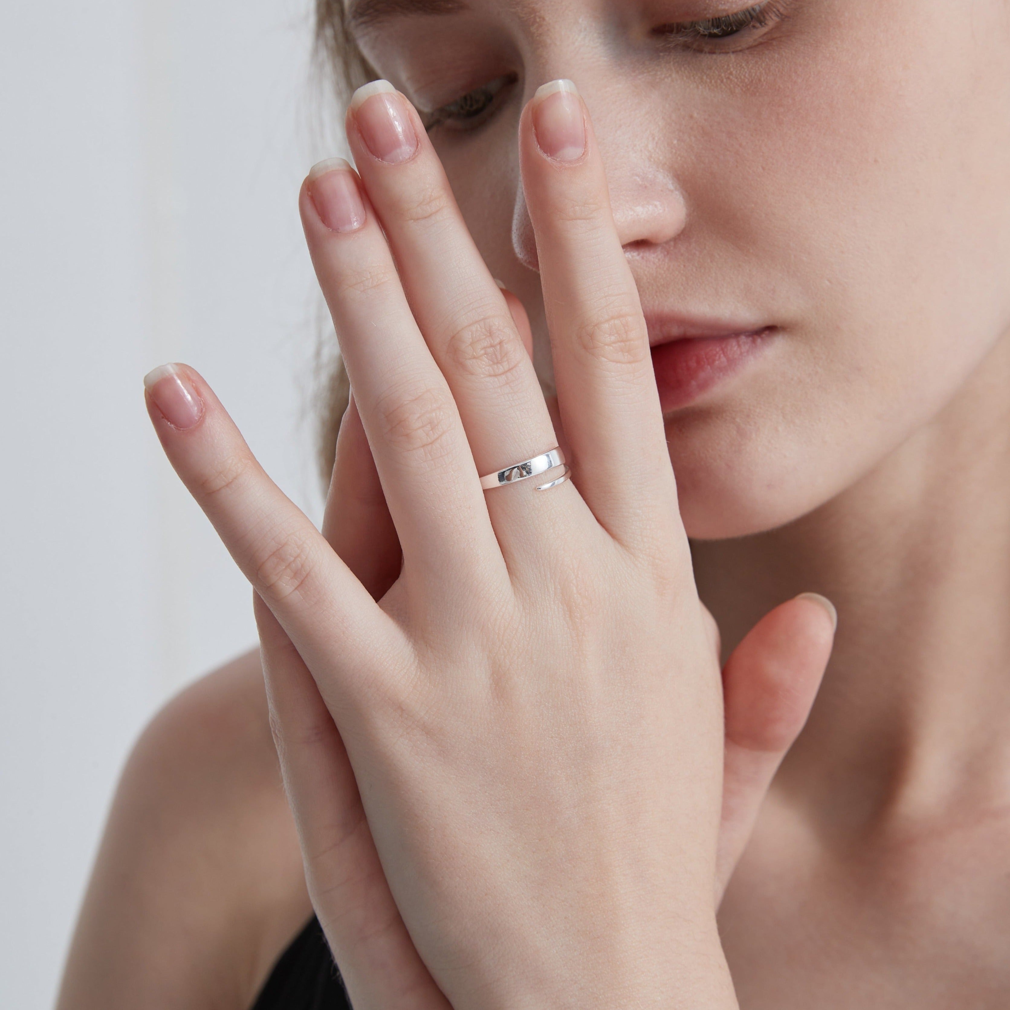 STMG Minimalist Adjustable Ring in silver on finger