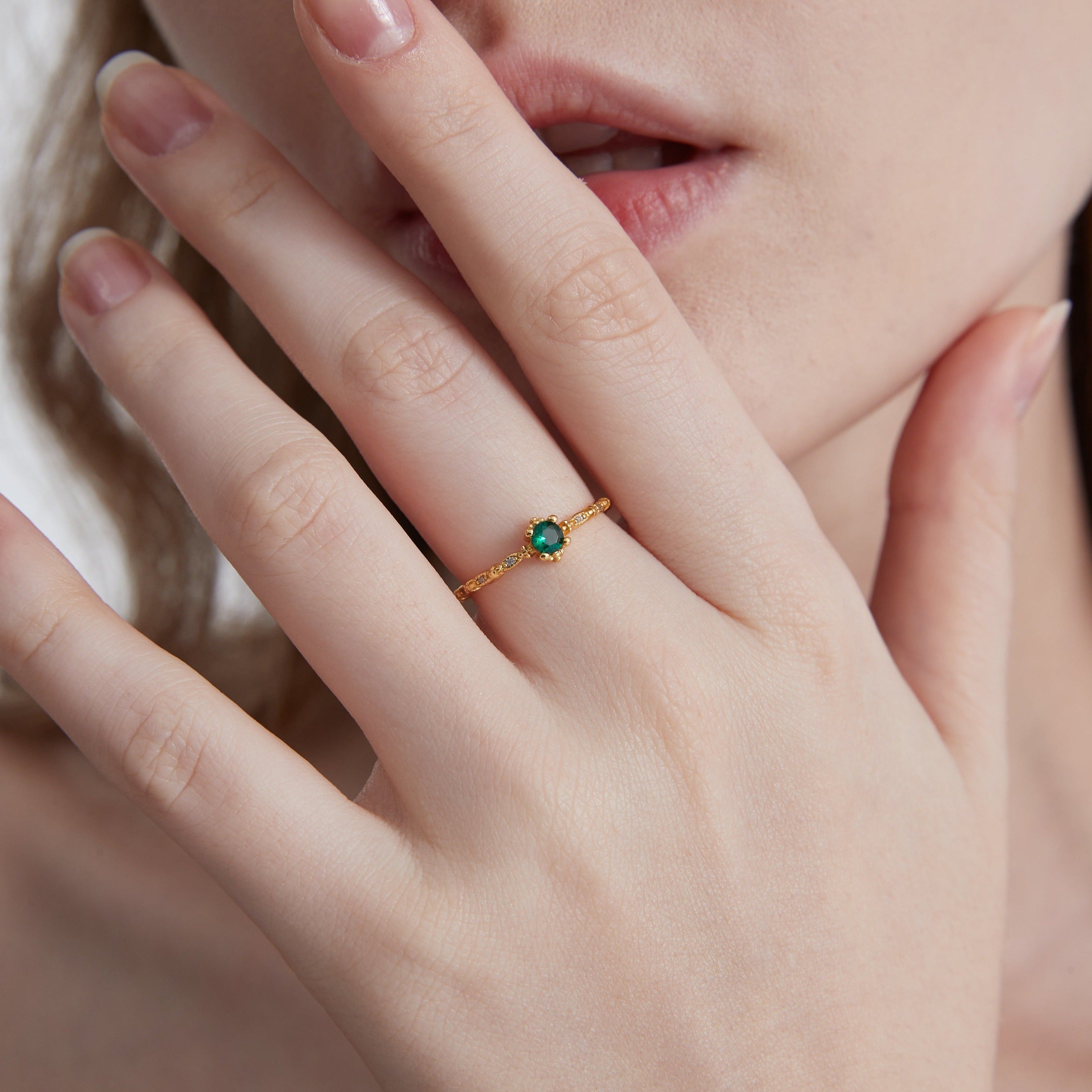 STMG Green Emerald Promise Ring on finger