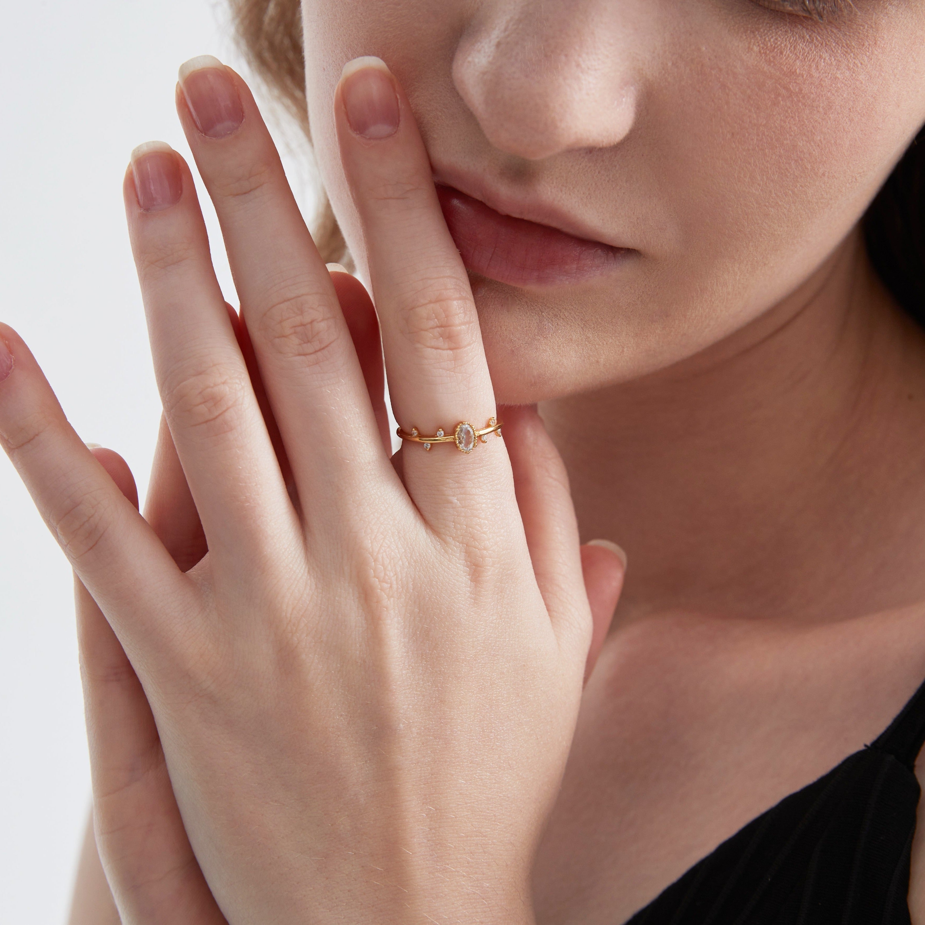 STMG Tiny CZ Leaf Adjustable Ring in gold on hand