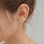 STMG Moissanite Diamond Stud Earrings on ear