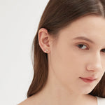 Duo-stars Stud Earrings in gold on ear