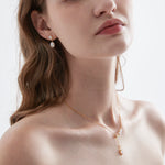 STMG Natural Pearl with Opal Dangle Earrings on ear with matching necklace on neck